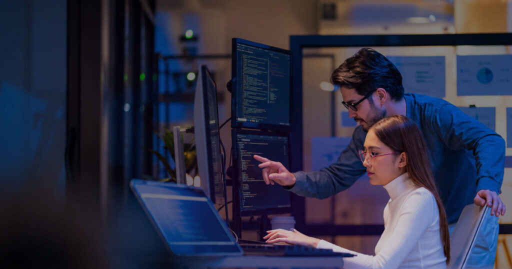 Cybersecurity analysts monitoring threat data for Los Angeles businesses